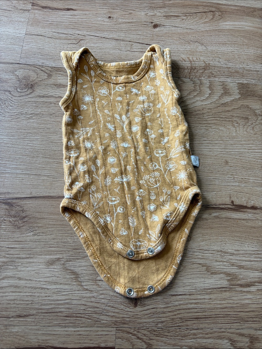 Sleeveless Floral One-Piece Bodysuit in Mustard